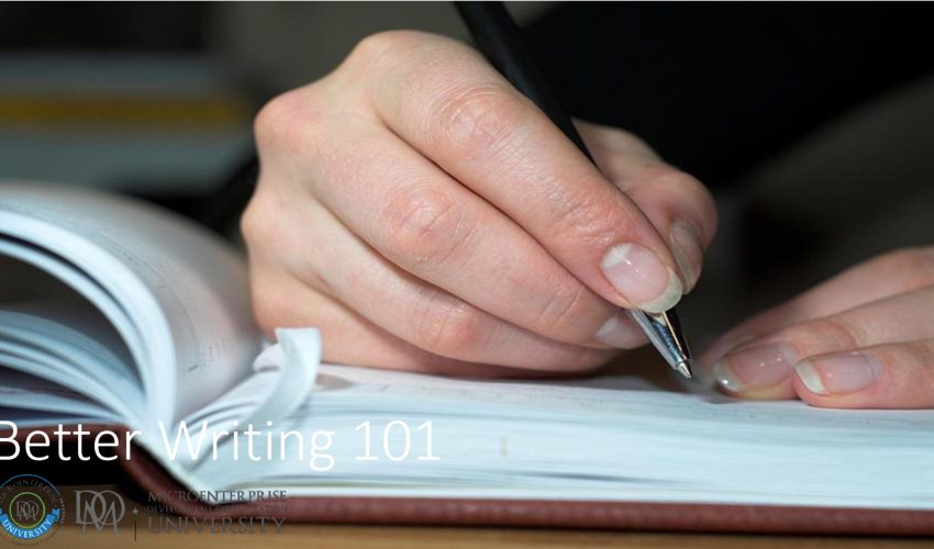 Hand writing with pen in open notebook