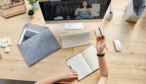 Remote learning setup with raised hand