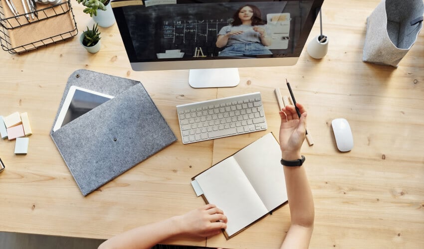 Remote learning setup with raised hand