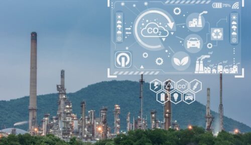 Industrial refinery with CO2 emissions monitoring overlay