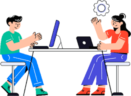 Two colleagues collaborating at computers