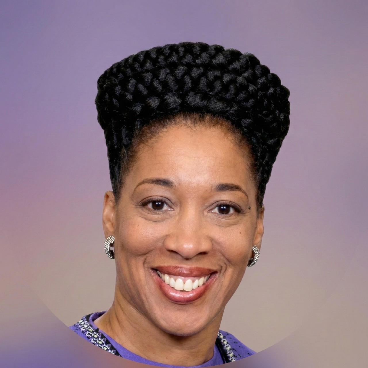 Smiling woman wearing braided updo