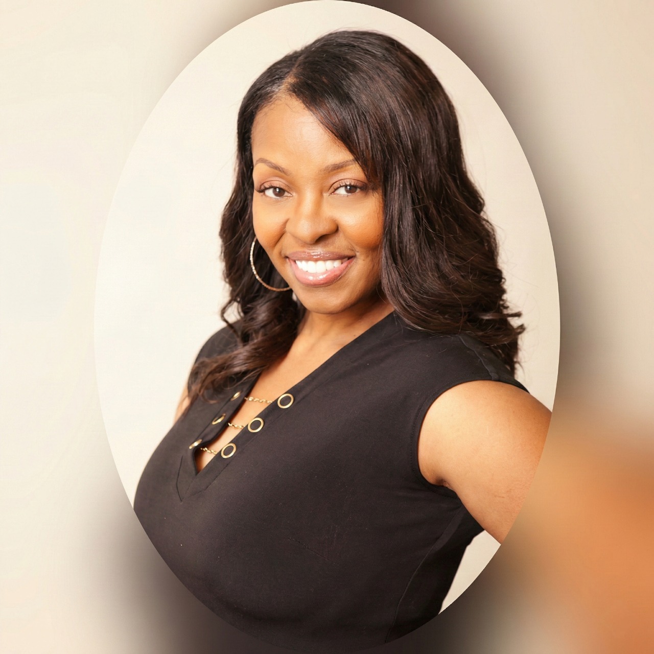 Smiling woman in black sleeveless top